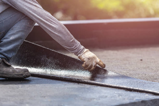 Professional Waterproofing technician working in Orleans, MI
